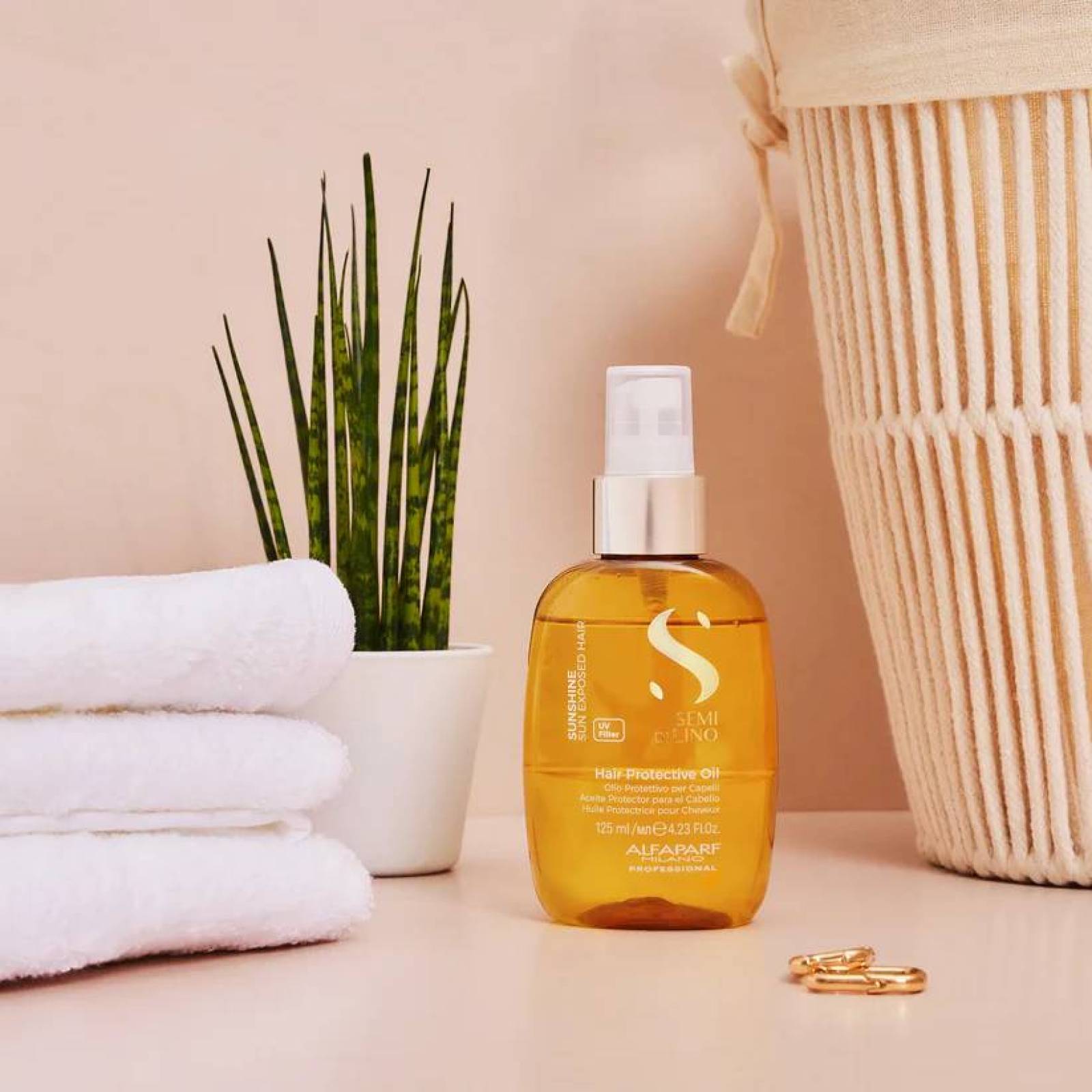 زيت لحماية الشعر للسباحة وأشعة الشمس